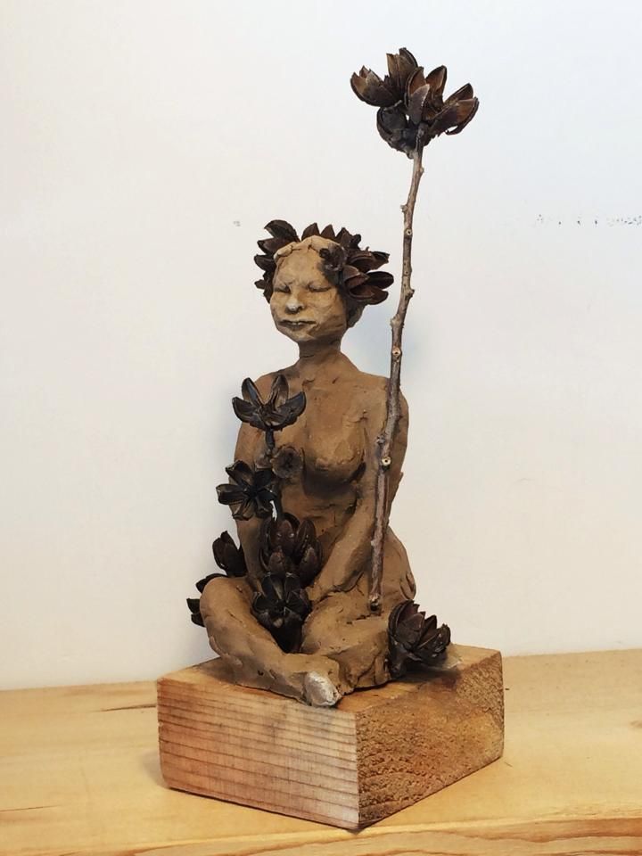 Clay sculpture, sitting pose
